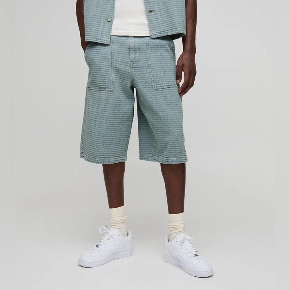 BoohooMAN Denim Textured Jorts in light blue